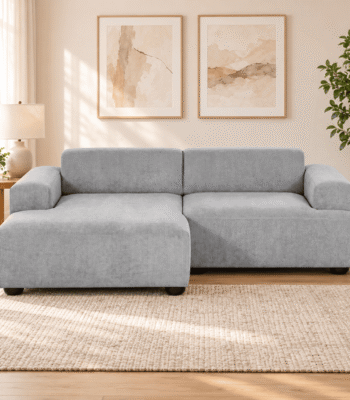 Sofá Seccional Florencia gris con chaise izquierdo en un living luminoso